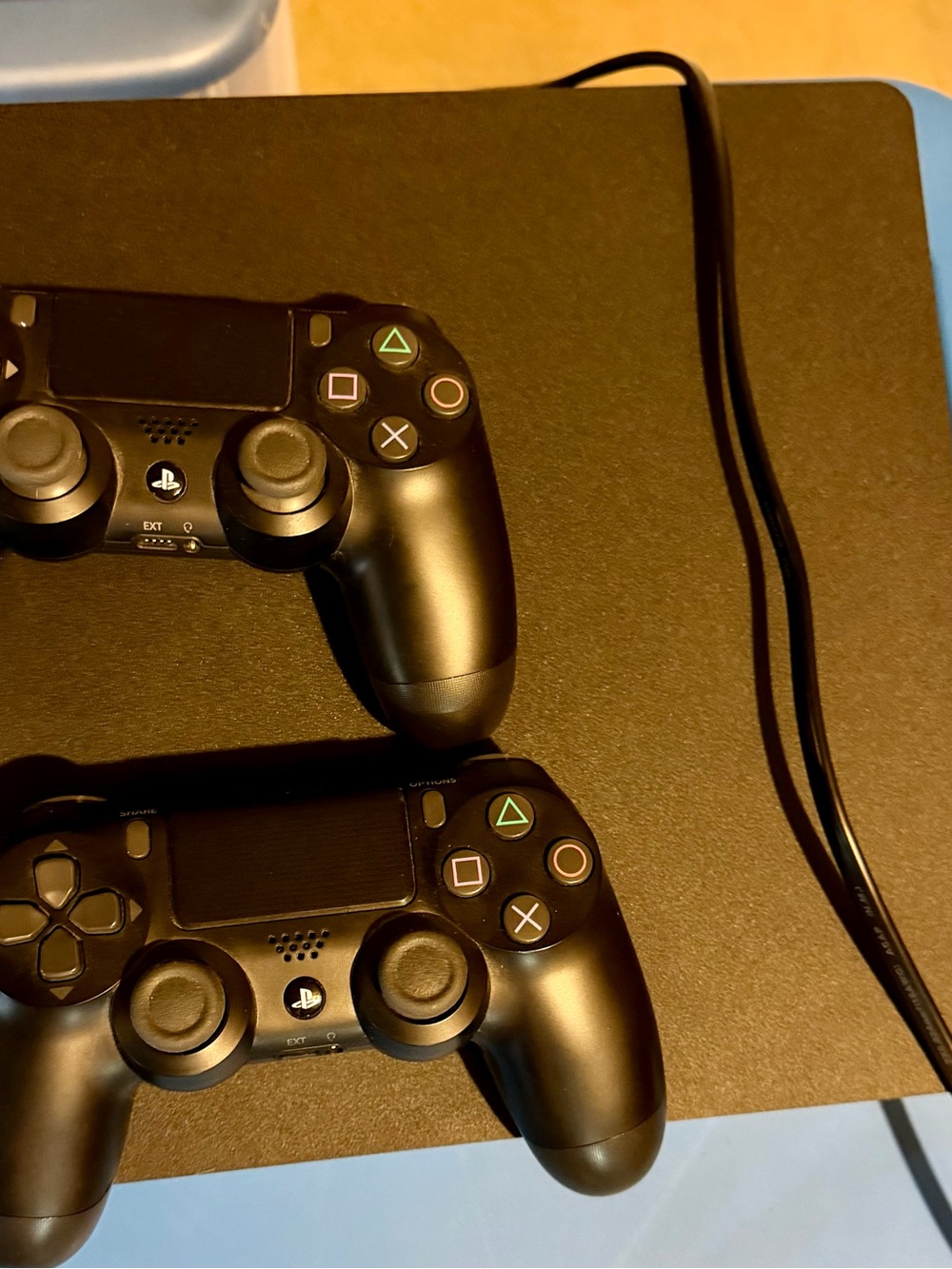 Sony Black PlayStation Slim Console with Two Black DualShock Controllers - Picture 2 of 2